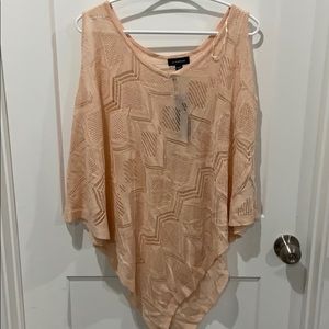 Light pink lace shawl with peekaboo shoulders